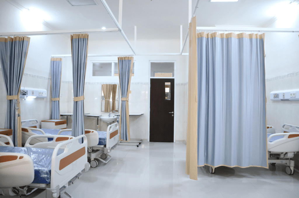 A hospital warden with a light blue colour scheme